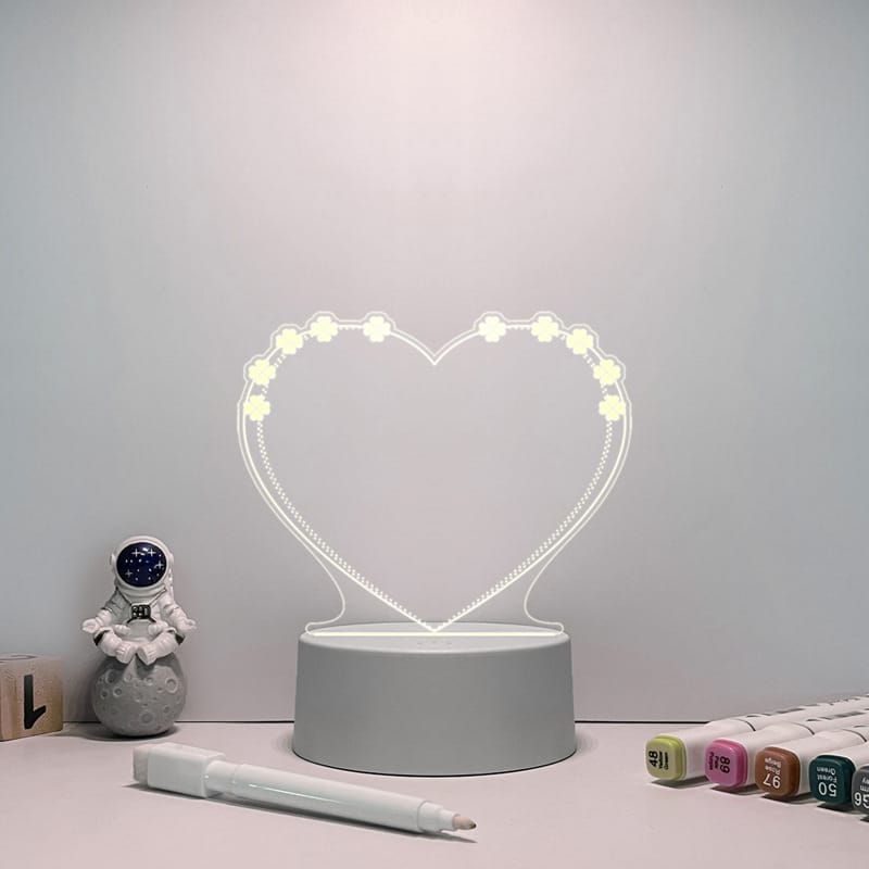 Heart-shaped lamp with illuminated bulbs, LightNote Blackboard.