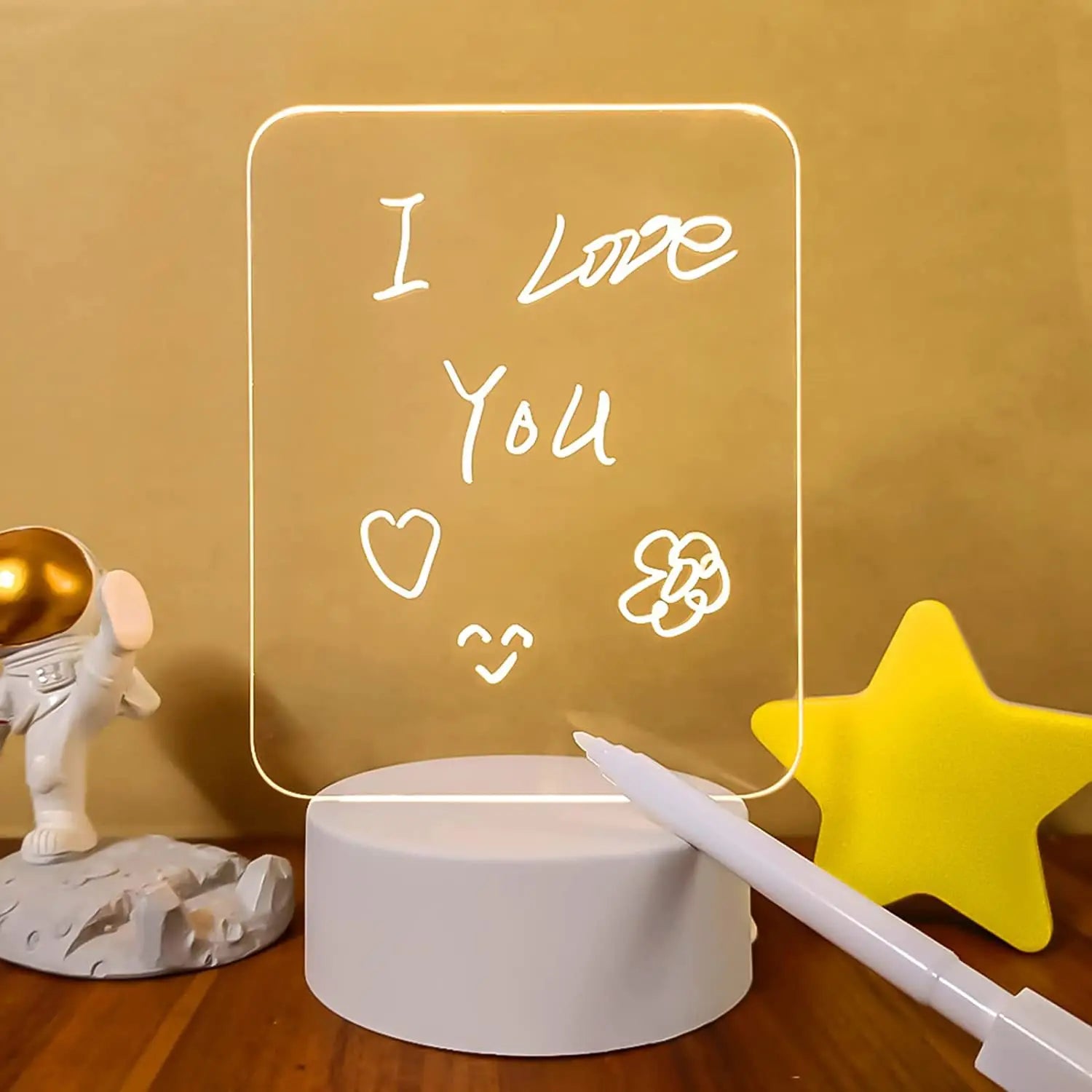 Illuminated acrylic sign with I Love You and doodles on LightNote Lavagnetta.