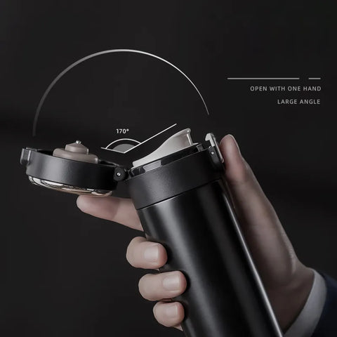 Sleek black SteelSip stainless steel thermal bottle with wide opening.