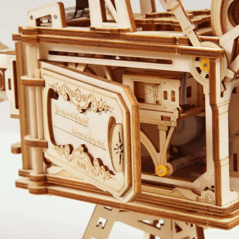 Wooden mechanical device for little directors with detailed instructions.