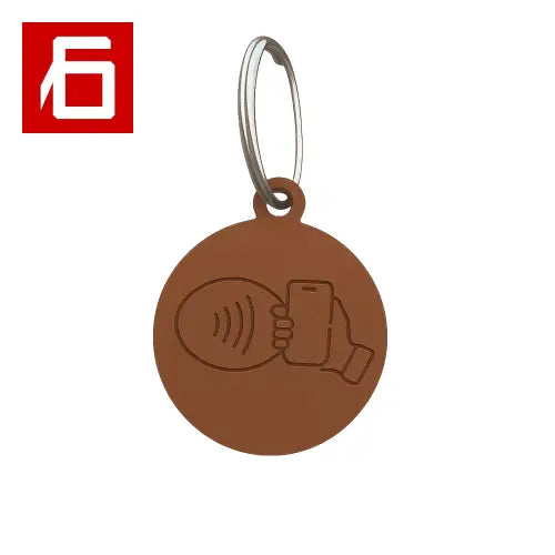 Brown Pet Finder NFC keychain with contactless payment symbol for easy pet tracking