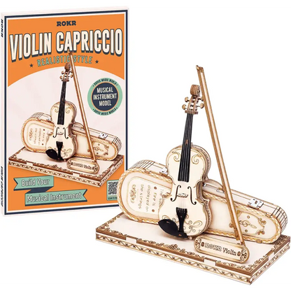 Un Modello In Legno Di Violino e Una Scatola